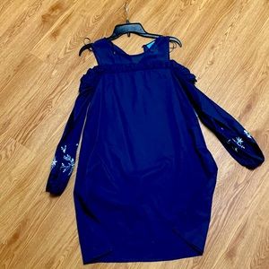 blue dress with flowers on the sleeves